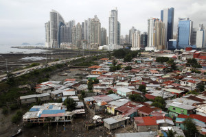 A general view of the low-income neighborhood known as Boca la Caja next to the business district in Panama City September 17, 2013. REUTERS/Carlos Jasso (PANAMA - Tags: SOCIETY CITYSCAPE) - RTX13P7O